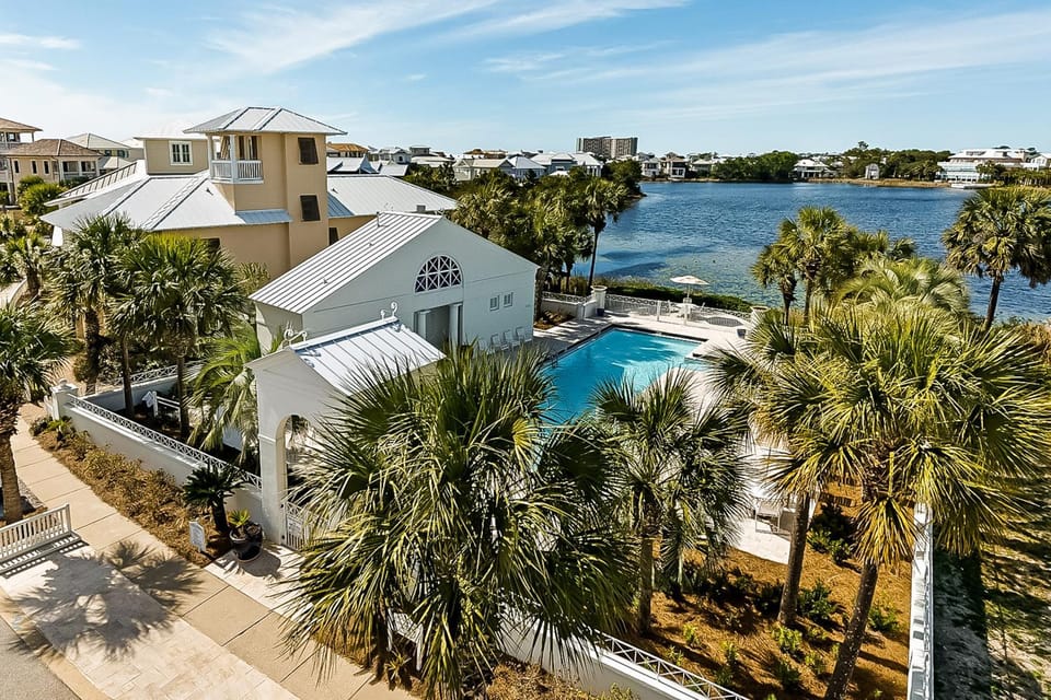 Stylish coastal retreat with pool hot tub & tennis - steps from the beach House in Carillon Beach
