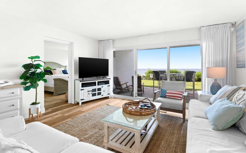 Ground floor oceanfront beachy condo with furnished patio outdoor pool gym Apartment in Miramar Beach