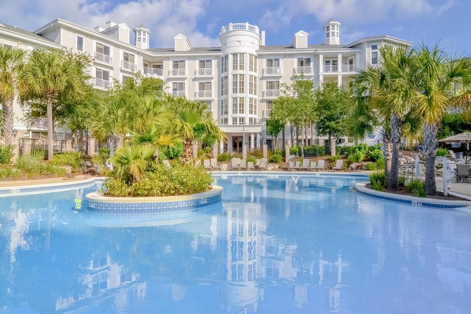 Pilot House getaway steps to shops & dining with pool & fitness center House in Miramar Beach