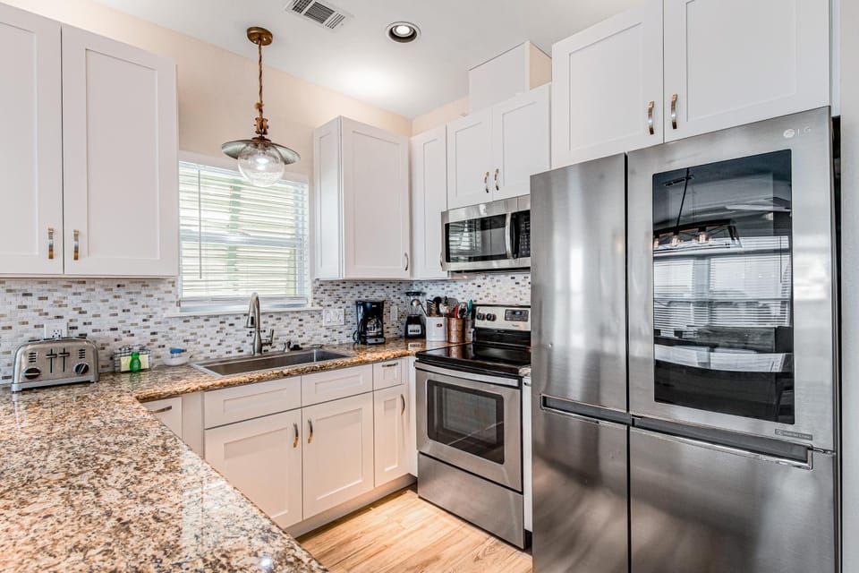 Charming getaway with lovely porches & shared pool - walk to the beach House in South Walton County