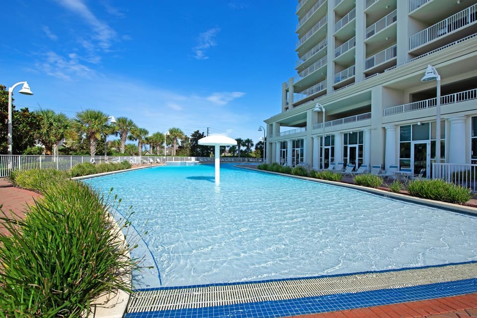 Inviting beach view condo with balcony amazing pool gym & W&D House in Miramar Beach