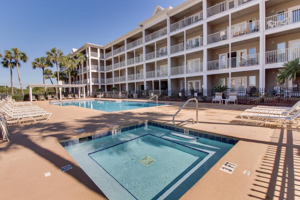 Ground-floor condo with pool hot tub & patio - walk to beach House in Perdido Key