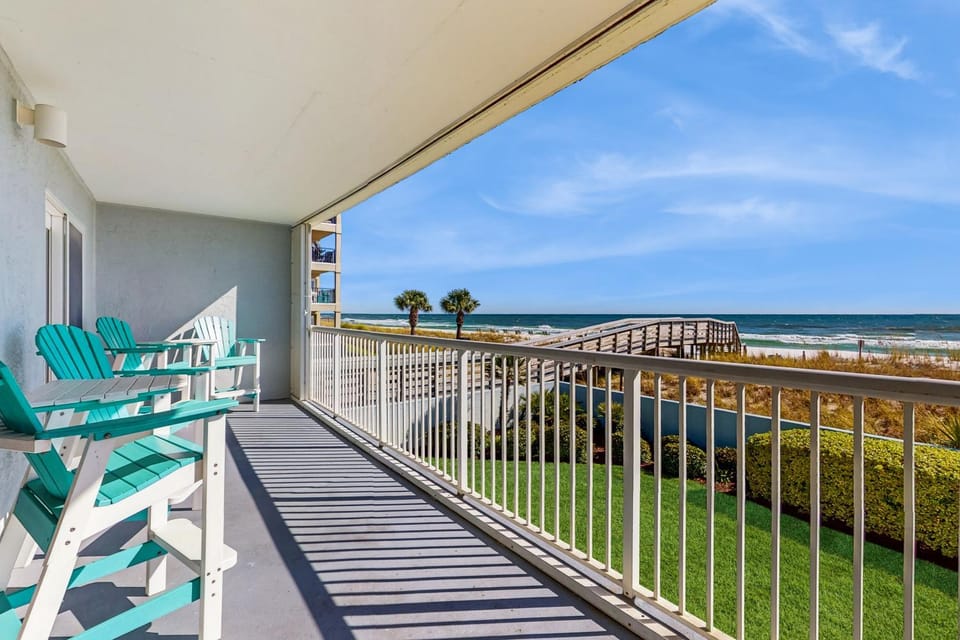 Second floor oceanfront condo with ocean view balcony central AC & pool access House in Okaloosa Island