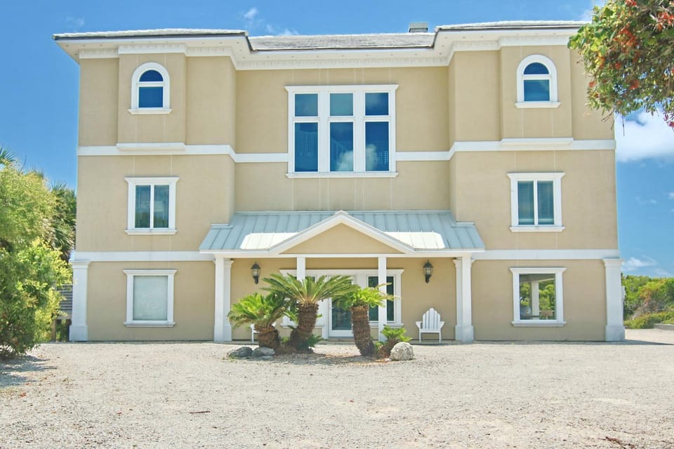 Beachfront home with elevator beach gear on-site neiborhood pool tennis & fitness room House in Saint George Island