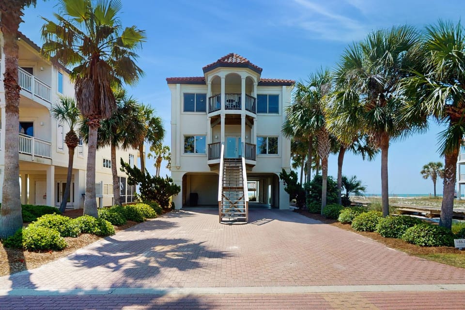 Dog-friendly beachfront home with private hot tub fireplace on-site pool AC House in Saint George Island