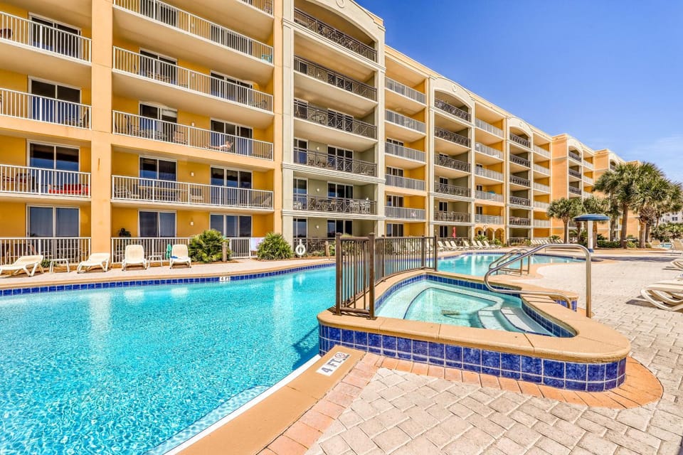 Beachfront condo with balcony hot tub pool gym open layout W&D & AC House in Okaloosa Island
