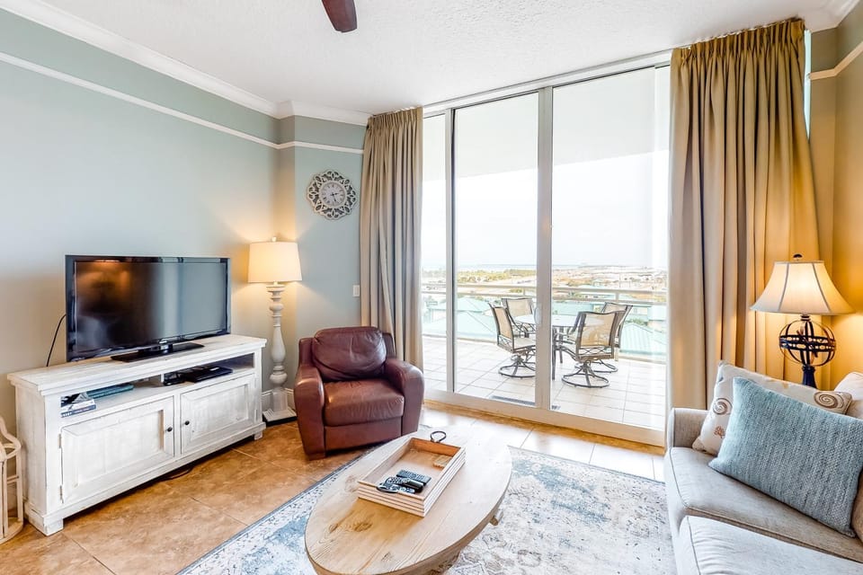 Condo with partial Gulf view fitness center pools & beach access - near shops House in Okaloosa Island