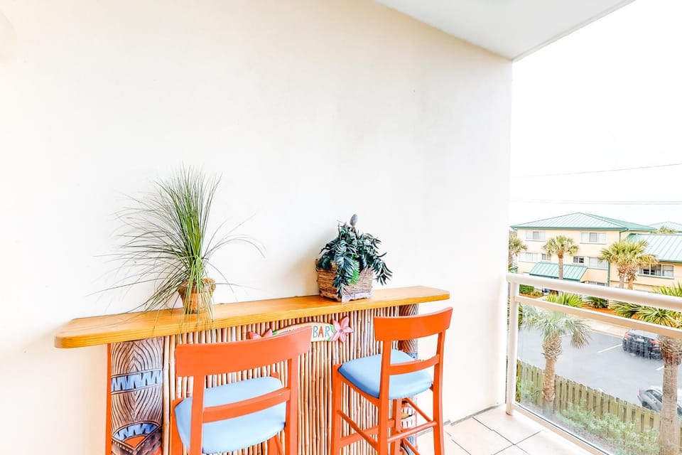 Vibrant Tropical Beach Getaway Including 2 Chairs and Umbrella Apartment in Okaloosa Island