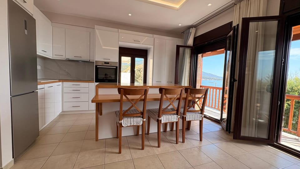 Kitchen or kitchenette, Seating area, Dining area, Sea view, oven, stove, kitchen, air conditioner