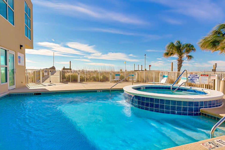 Beachfront Condo wLarge Balcony Shared Hot Tub Pool Sauna Free WiFi AC House in West Beach