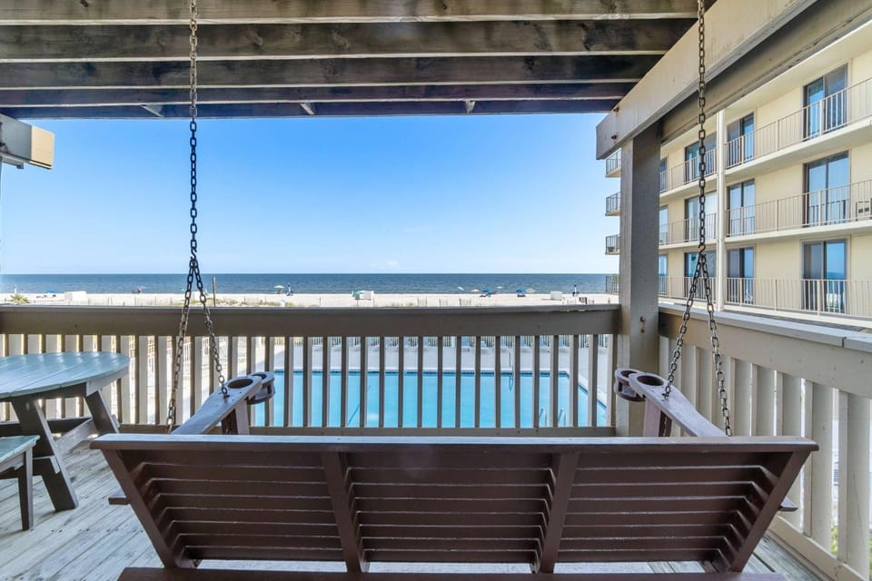 Ocean-view condo with pool access outdoor seating central AC & WiFi House in West Beach