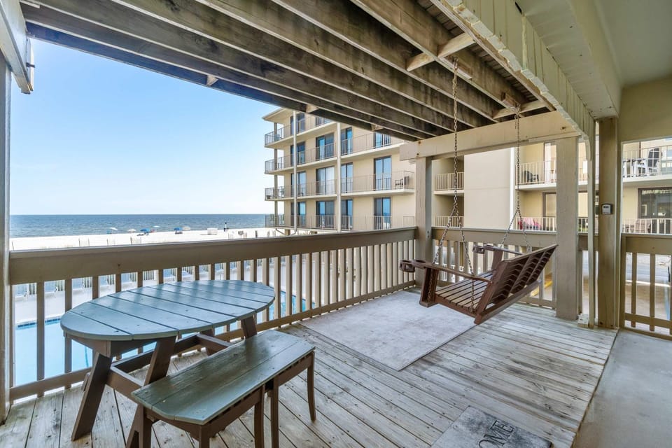 Ocean-view condo with pool access outdoor seating central AC & WiFi House in West Beach