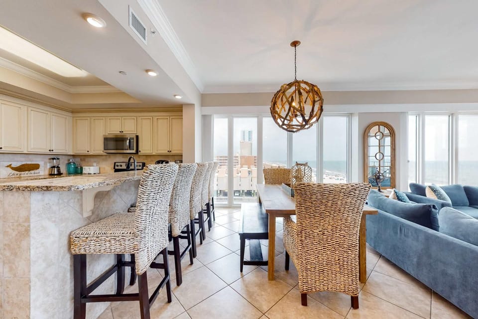 Corner condo with stunning Gulf-front view pool hot tub gym W&D & AC House in West Beach