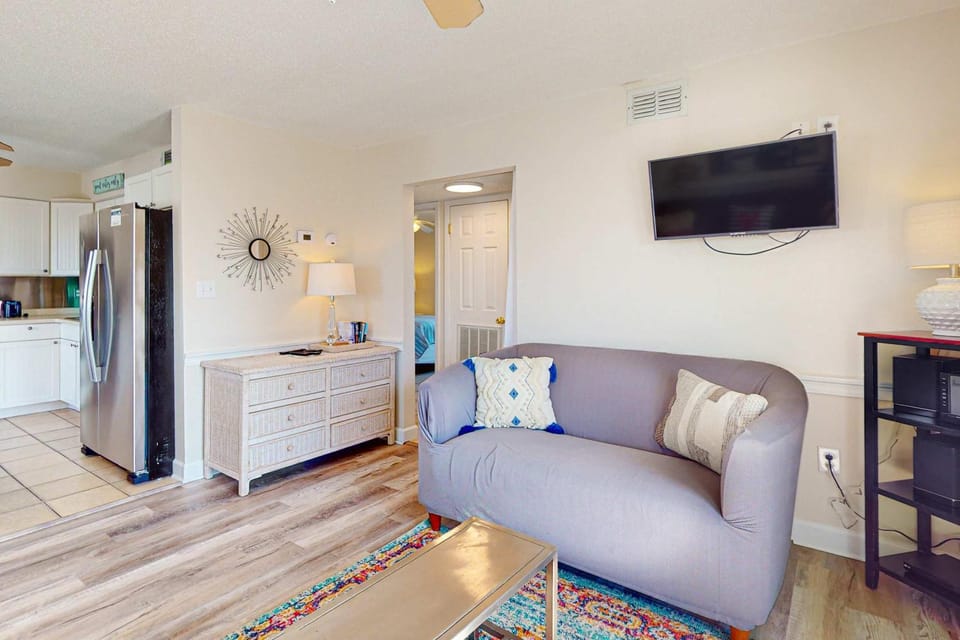 Top-floor condo with pool & great views - close to the beach House in West Beach