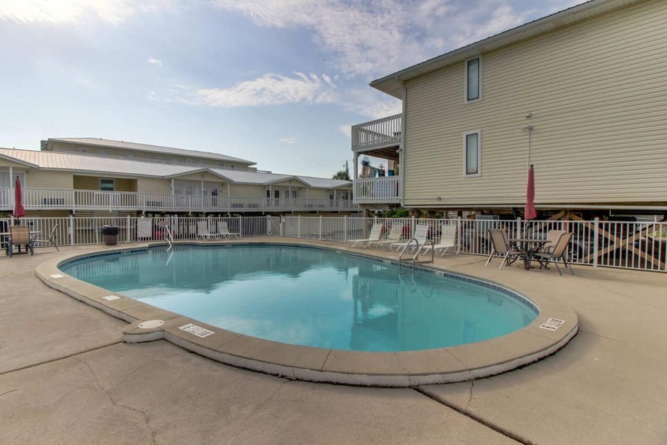 Top-floor condo with pool & great views - close to the beach House in West Beach