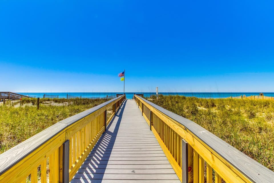 Corner condo with Gulf lagoon views beach access & pools lazy river House in West Beach