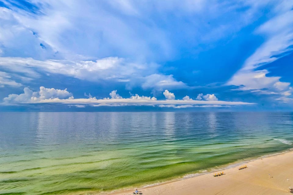 Corner condo with Gulf lagoon views beach access & pools lazy river House in West Beach