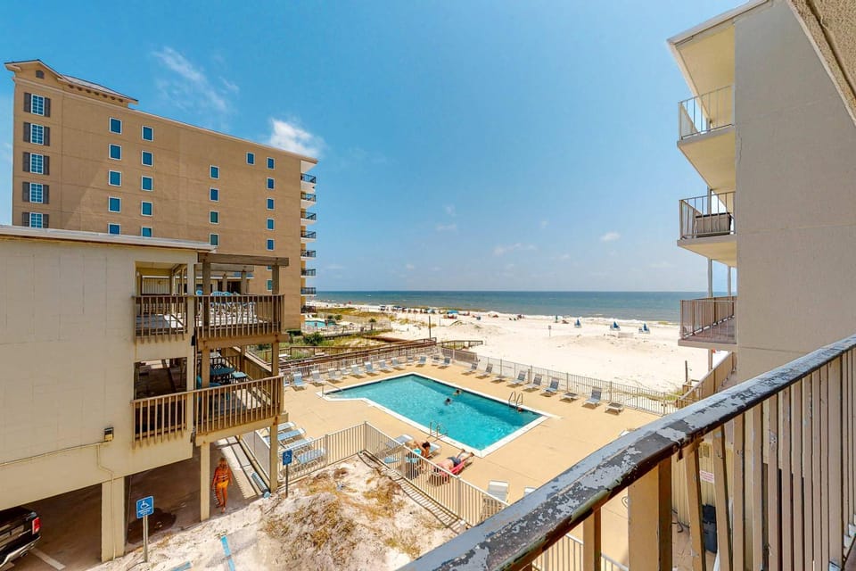 Beachfront condo with balcony overlooking Gulf of Mexico & resort pool House in West Beach