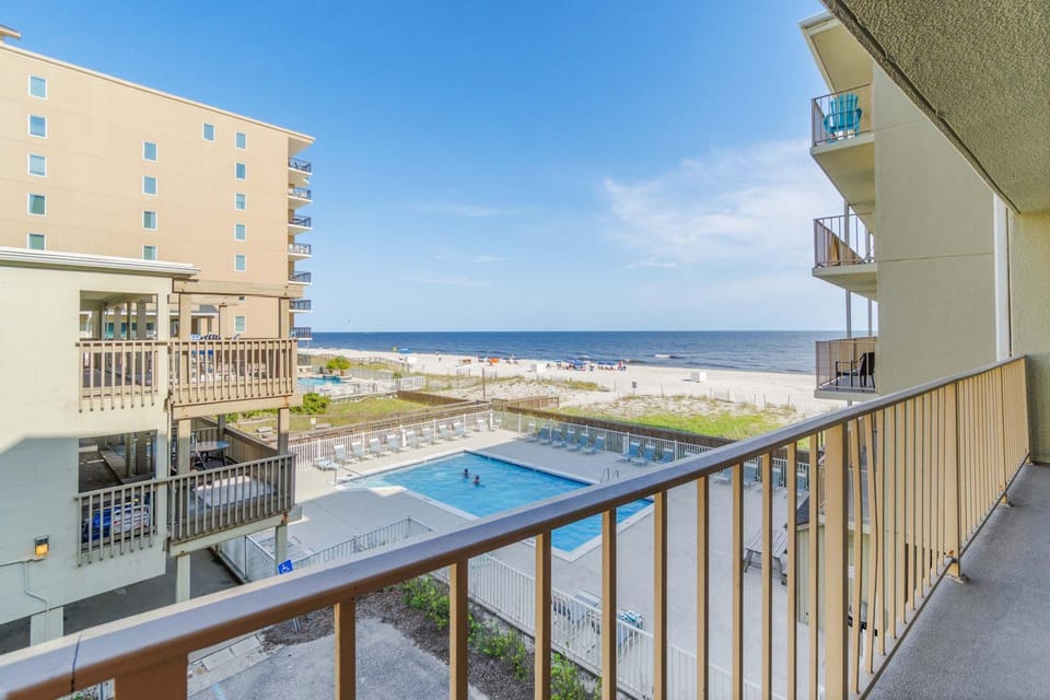 Beachfront condo with balcony overlooking Gulf of Mexico & resort pool House in West Beach