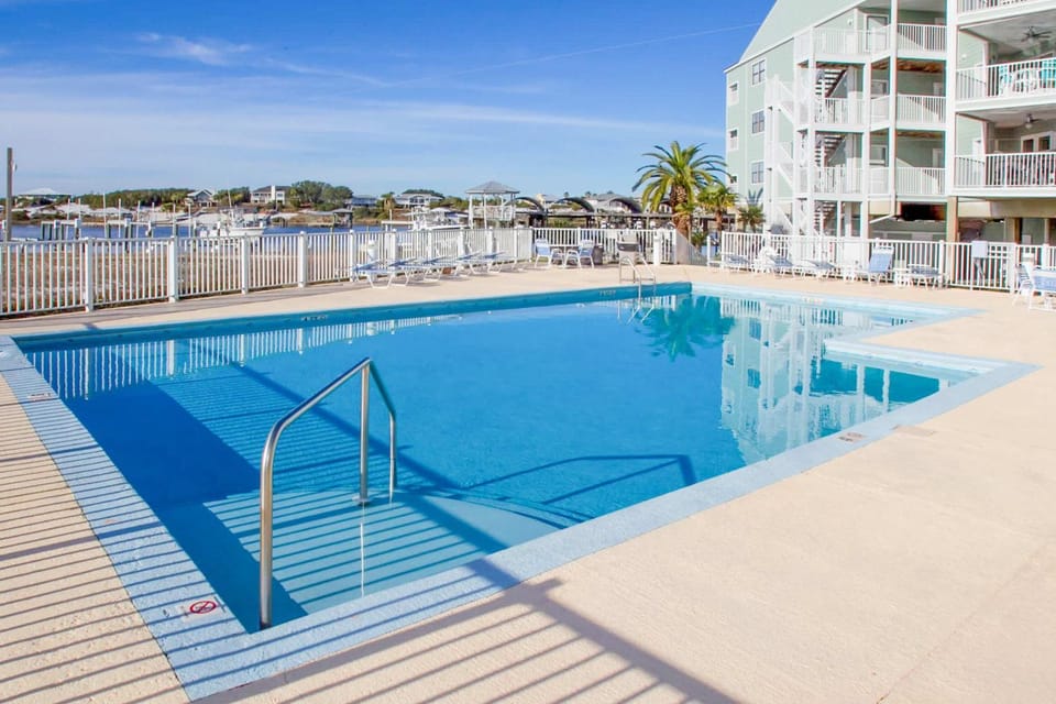 Updated condo with Gulf & river views & pool - across from beach & near dining House in Ono Island