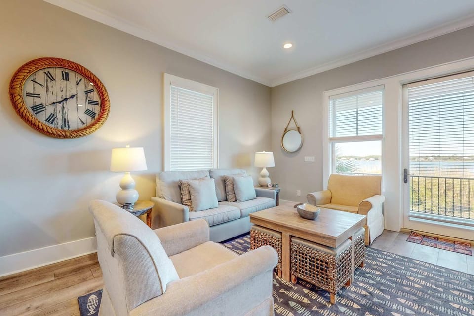Pristine waterfront escape just steps to beach with community pool washer dryer House in West Beach