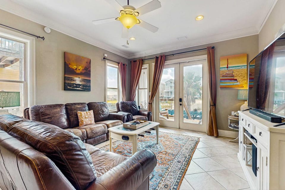 Lofted beach getaway with lovely water views saltwater pool & multiple decks House in West Beach