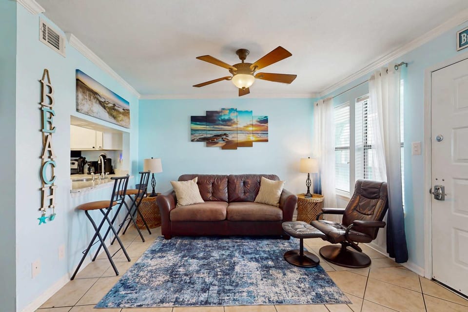 Coastal condo just steps from the beach w shared pool BBQ area WiFi AC W&D House in West Beach