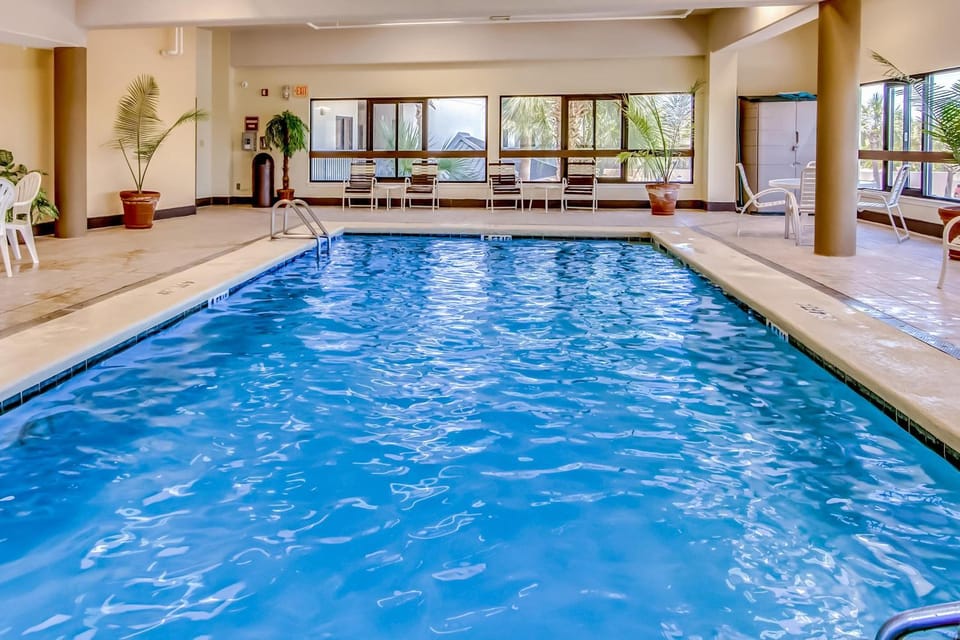 Beachfront condo with shared outdoor pool heated indoor pool sauna & grill area House in Orange Beach