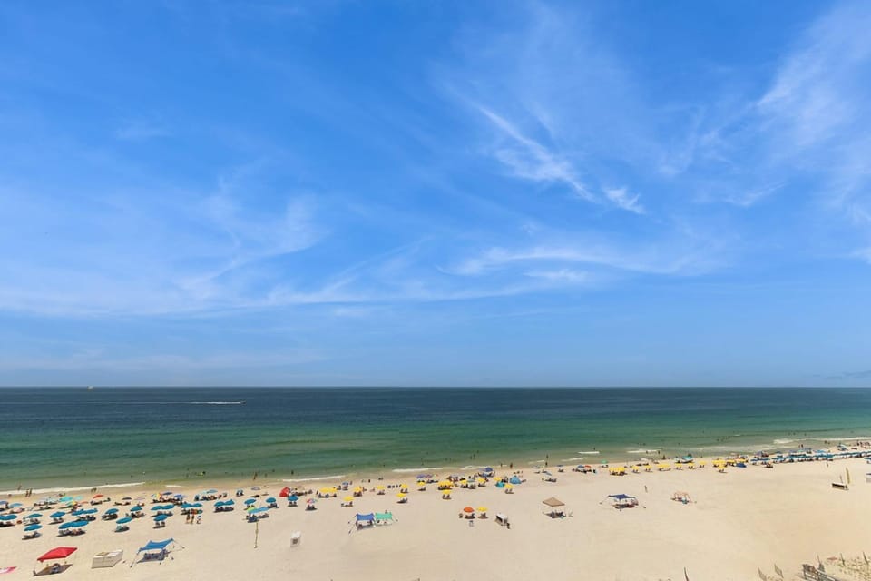 Bright beachfront condo with 2 Gulf-side pools tennis courts & fitness room House in Orange Beach