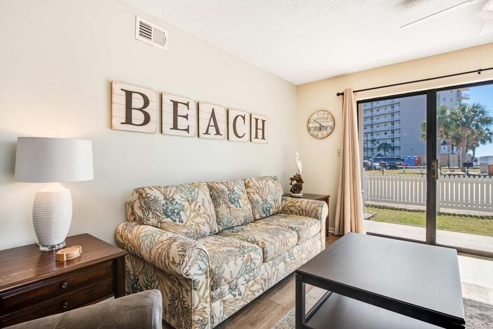 Ideally located home in beachfront building with WiFi pool sauna & tennis House in Orange Beach