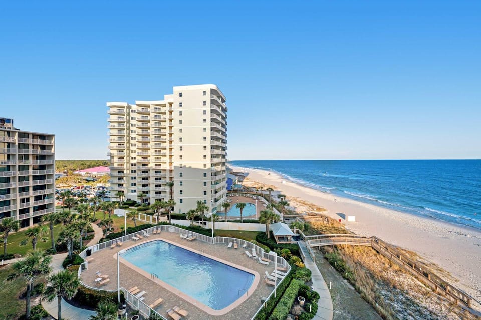 Wonderful beachfront vacation complex with private pool WiFi balcony & AC House in Orange Beach