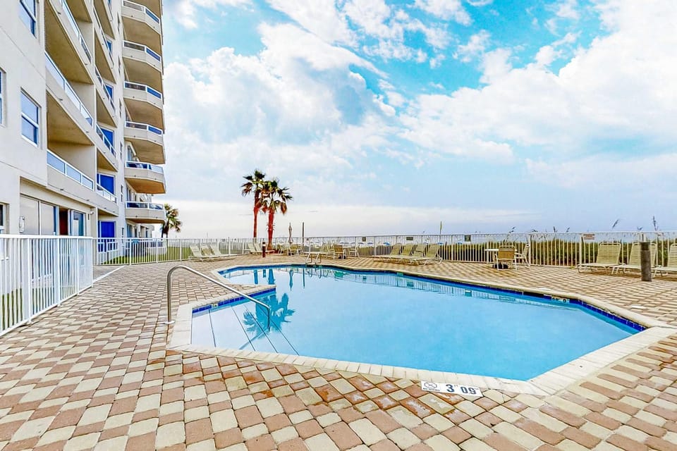 Beachfront resort condo with shared pool tennis court free WiFi central AC House in Orange Beach