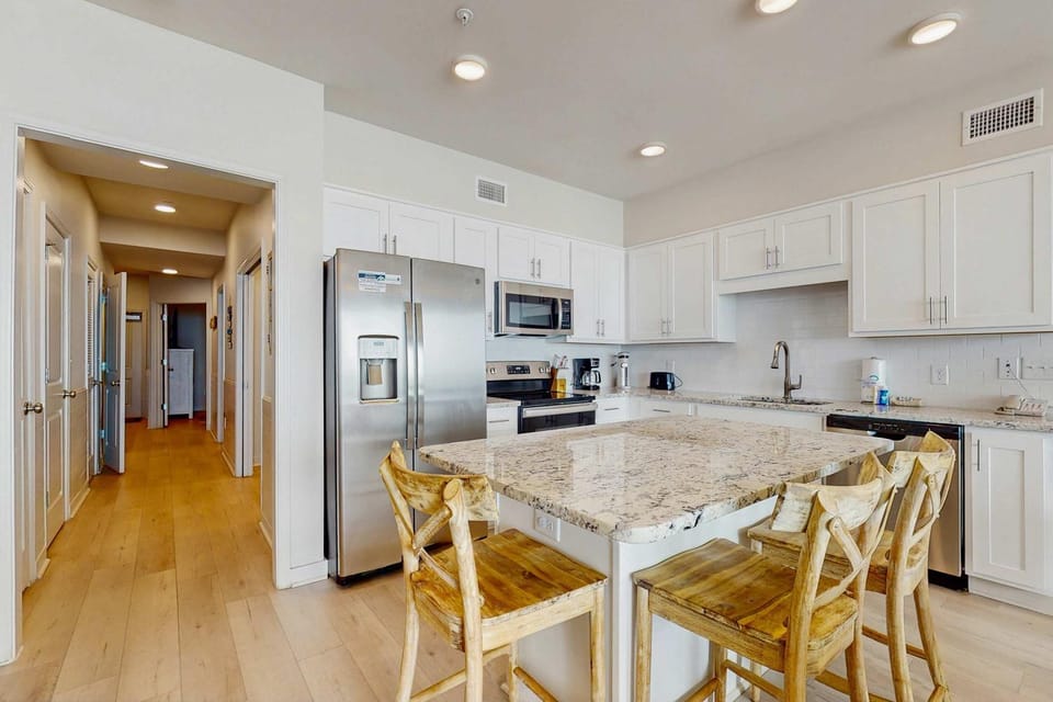 Fantastic home on beach with pool hot tub free WiFi elevator & central AC House in West Beach