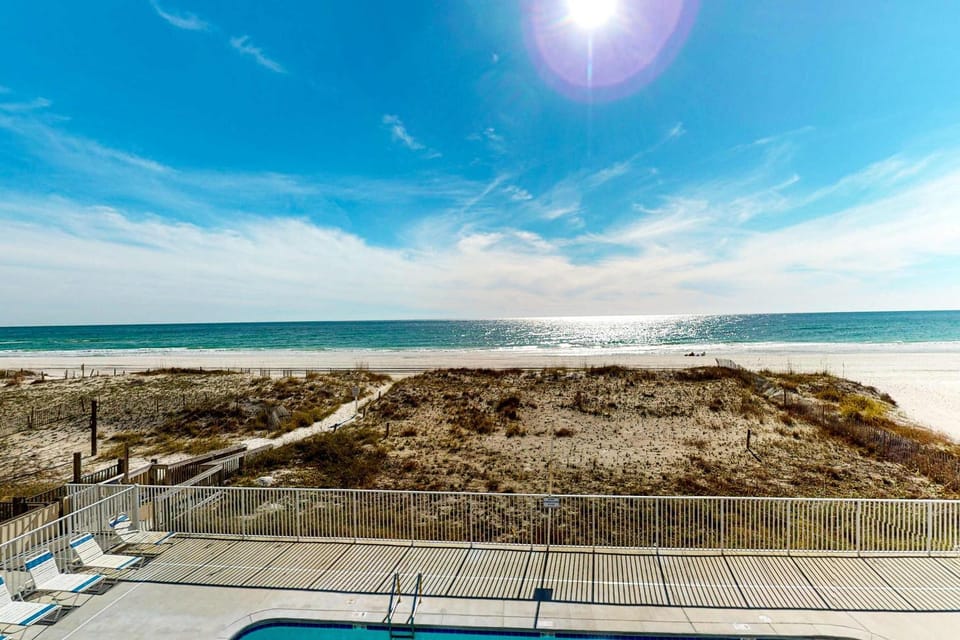 This roomy condo is located on the second floor of Buena Vista an oceanfront property with a balcony pool gated access to the beach and washer dryer House in West Beach