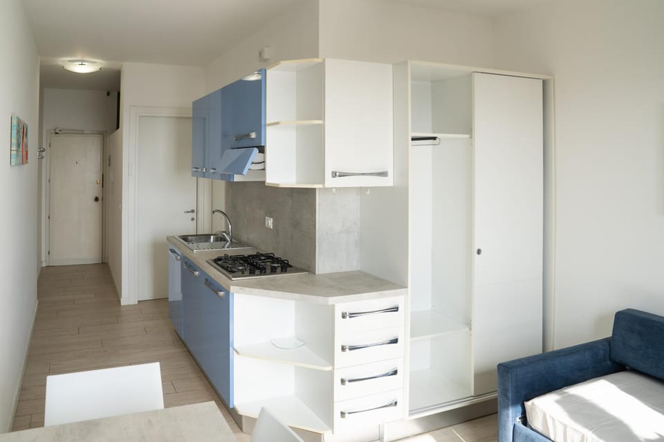 Kitchen or kitchenette, oven, stove