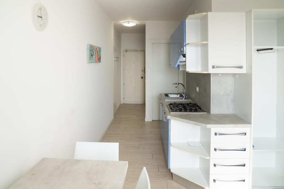Kitchen or kitchenette, oven, stove