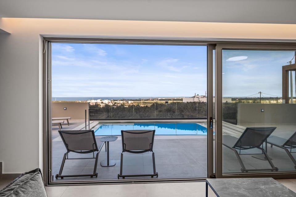Patio, Living room, Pool view, Sea view, sunbed, air conditioner
