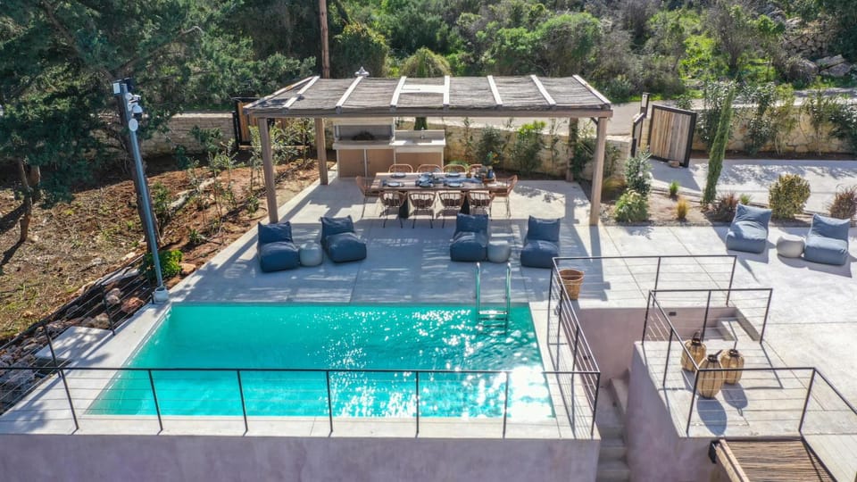 Patio, Day, Natural landscape, Pool view, Swimming pool, sunbed