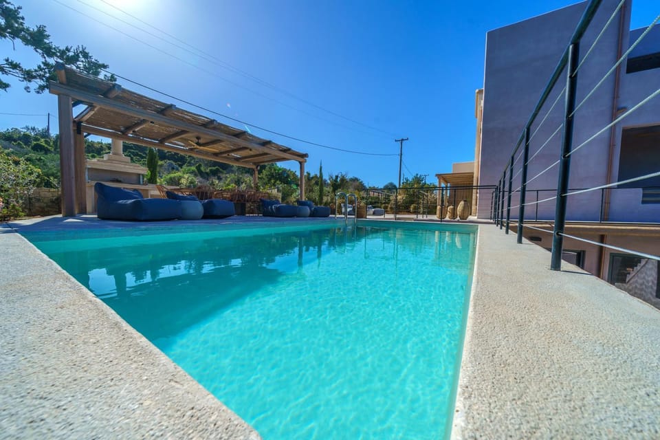 Property building, Pool view, Swimming pool, sunbed