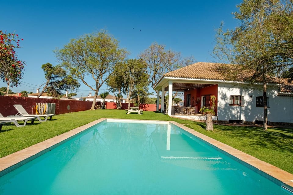 Property building, Living room, Swimming pool