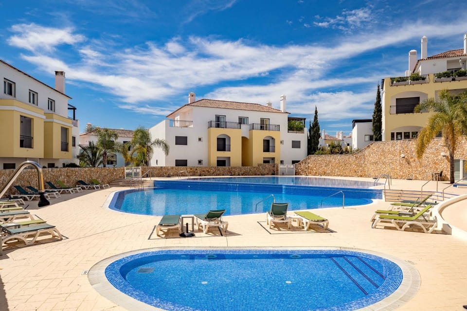 Property building, Living room, Swimming pool