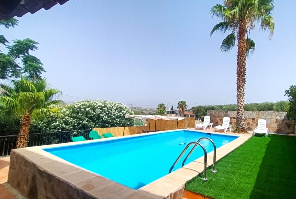 Property building, Living room, Swimming pool