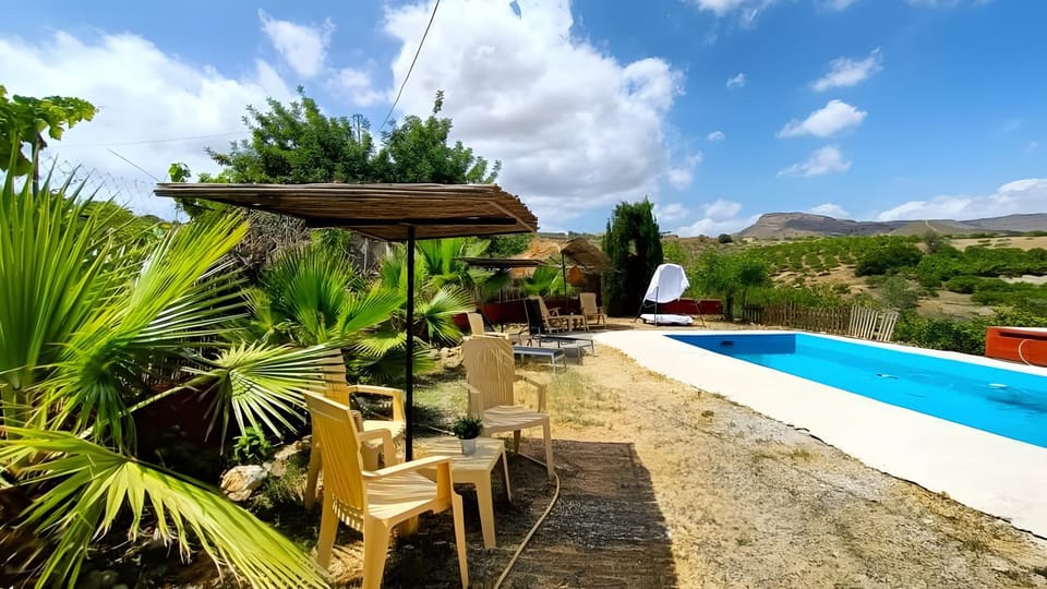 Property building, Living room, Swimming pool
