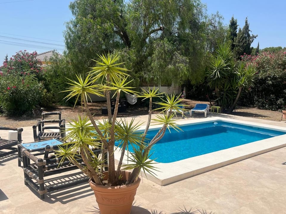Property building, Living room, Swimming pool