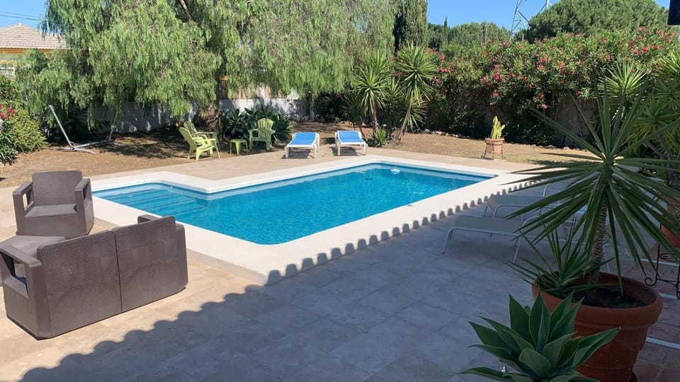 Property building, Living room, Swimming pool
