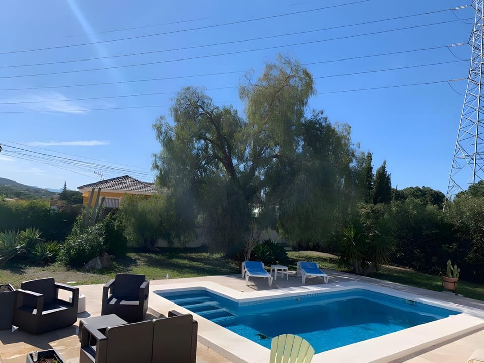 Property building, Living room, Swimming pool