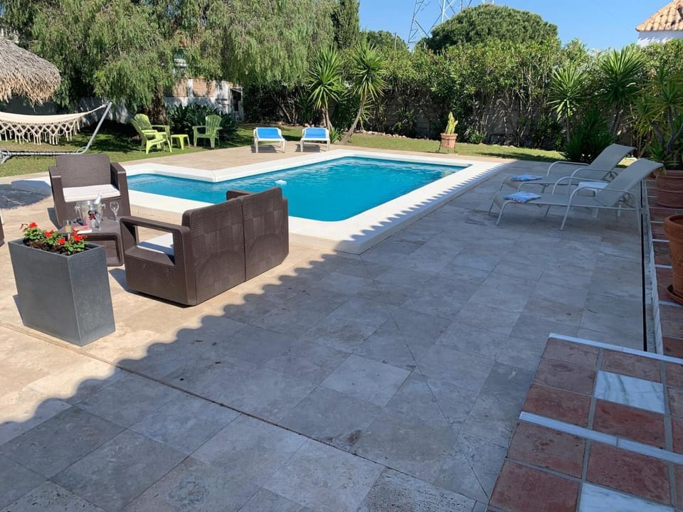 Property building, Living room, Swimming pool