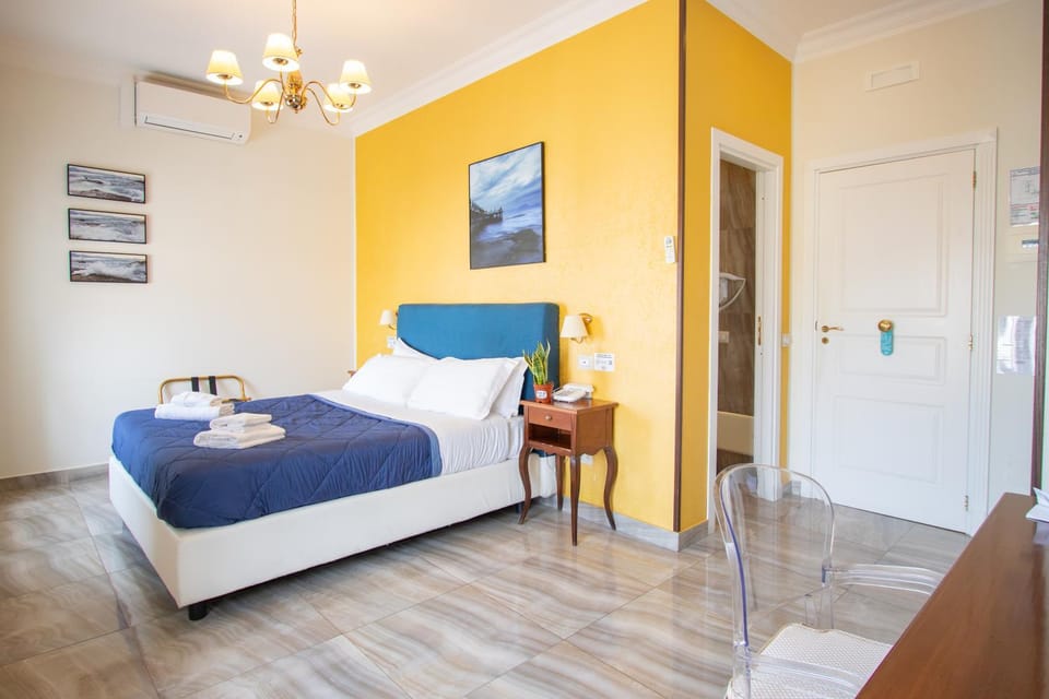 Bed, Photo of the whole room, Bedroom, towels, air conditioner