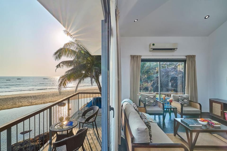 Natural landscape, View (from property/room), Living room, Seating area, Dining area, Beach, Sea view
