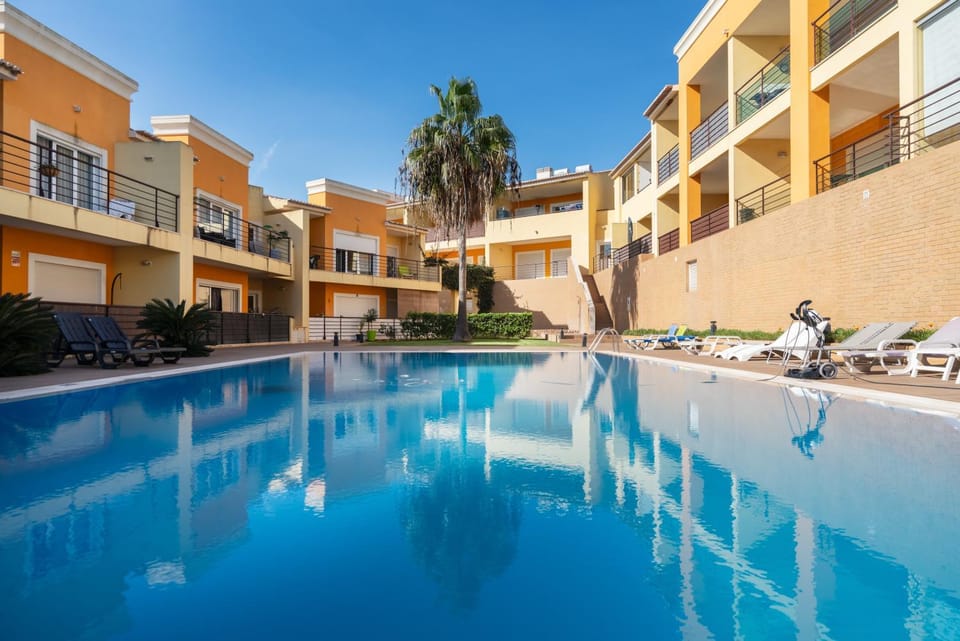 Property building, Living room, Swimming pool
